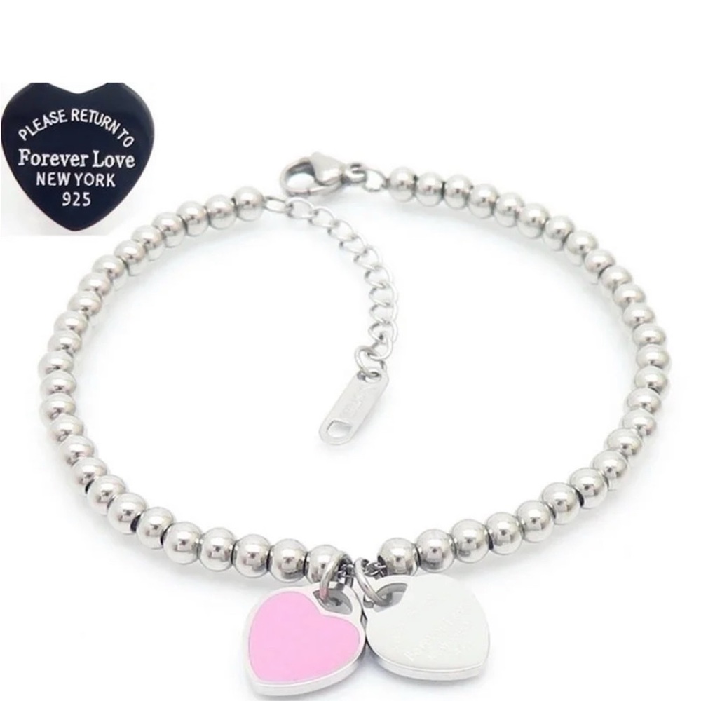 Silver Bracelet with a pink and silver Heart Charms NWOT